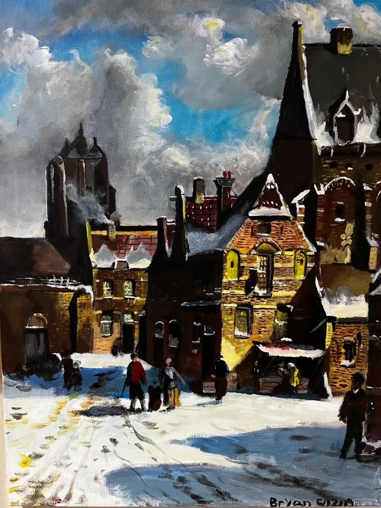 Snow-covered European town with buildings and figures in the snow