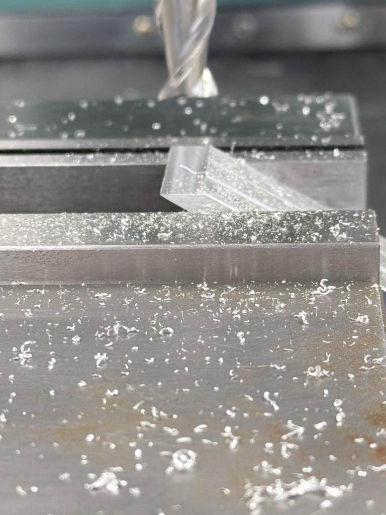 Milling the aluminum workpiece during manufacturing